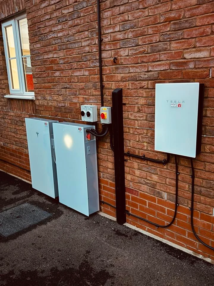 Tesla Powerwall 3 home battery mounted on a clean wall. Tesla Powerwall 3 home battery mounted on a clean wall.